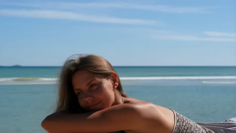 woman relaxing peacefully on the beach