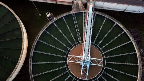 4k video : aerial view of water treatment plant with sunset