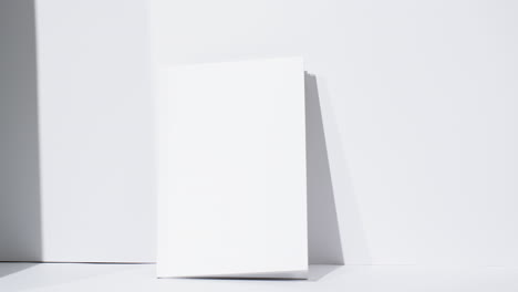 Video-of-book-with-blank-white-pages-and-copy-space-on-white-background