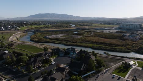 suburban community along the jordan river in lehi, utah - aerial panorama