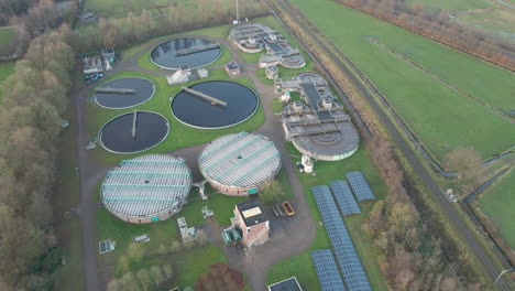 aerial of sewage water treatment plant with waste water flowing through aeration tank