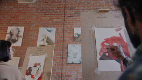 art students painting in a studio