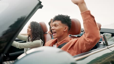 group of friends on a road trip in a convertible