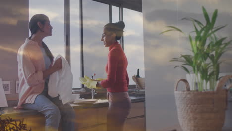 chatting in kitchen, two women with cloud reflections on window, animation visible