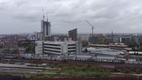 drone shot tracking train near manchester piccadilly station 06