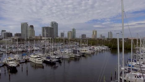 4k aerial drone video of sailboats and yachts at marina on tampa bay in downtown st