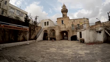 little mosque in sanliurfa exterior view winter clouds in sky