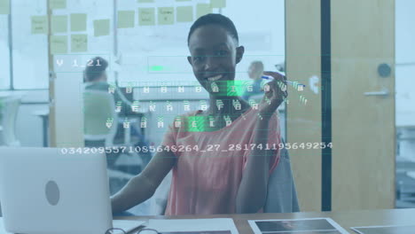animation of data processing over african american businesswoman in office