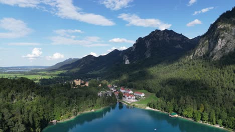 hohenschwangau castle alpsee lake in germany near fussen drone aerial view