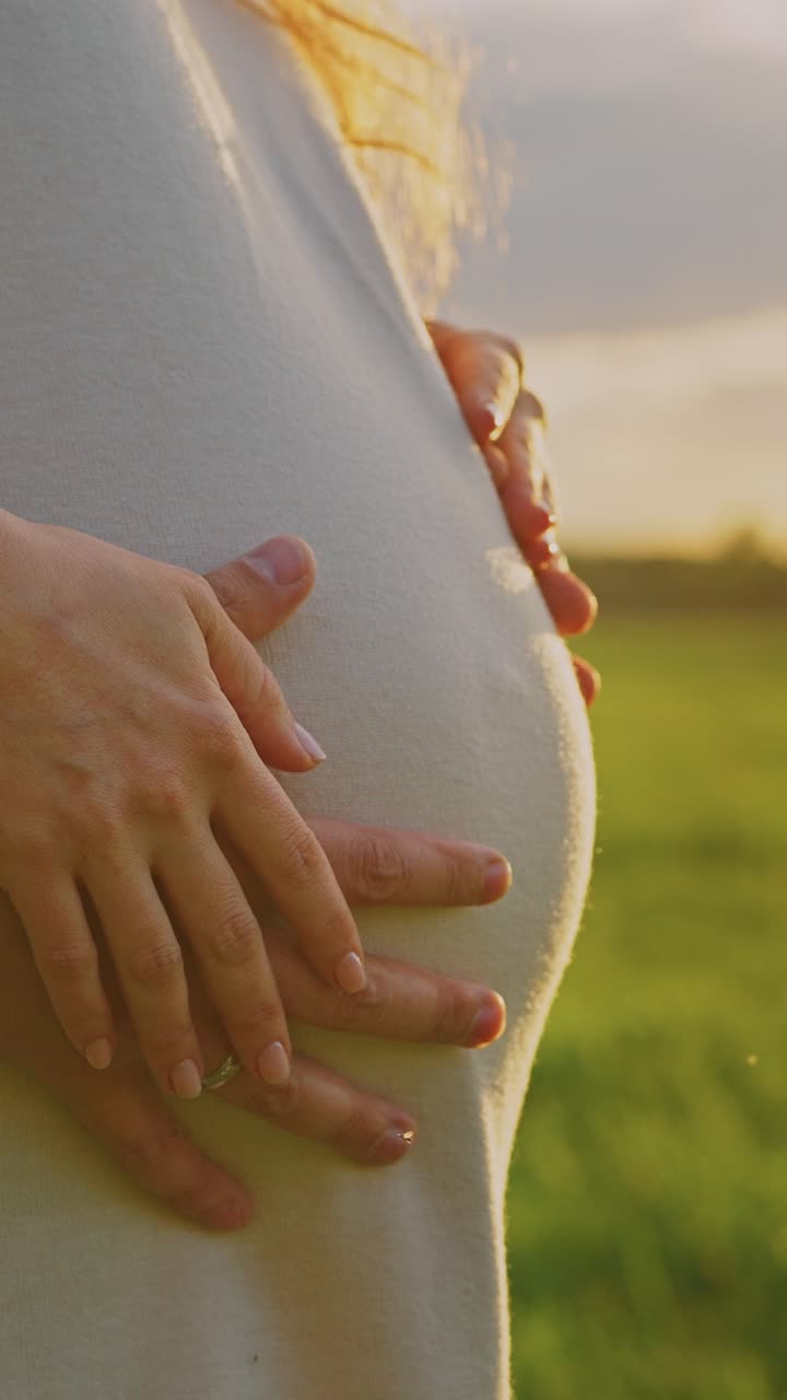 Loving Embrace of a Pregnant Woman