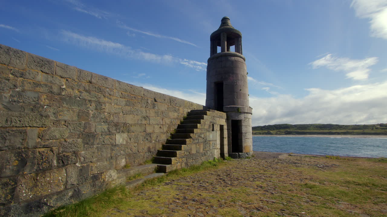 Ancient Stone Tower on Coastal Wall