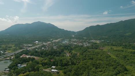 aerial drone view, serian district town ,summer with beautiful green trees,new building and water park lake, water from the mountain sarawak,borneo.