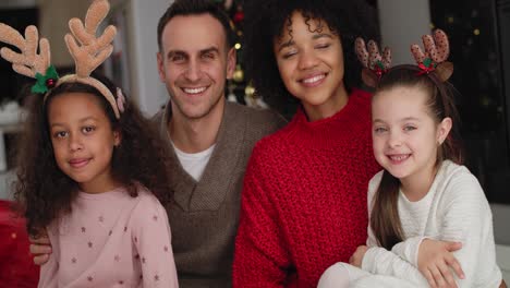 handheld view of family spending christmas together at home