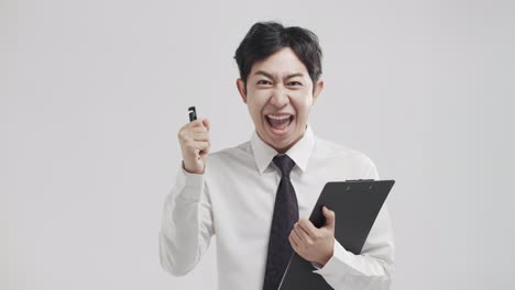 Young-Asian-man-is-excited-with-his-company's-success-during-an-online-video-conference