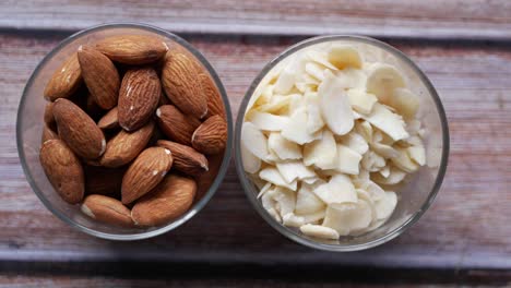 almonds and almond slices in glass bowls