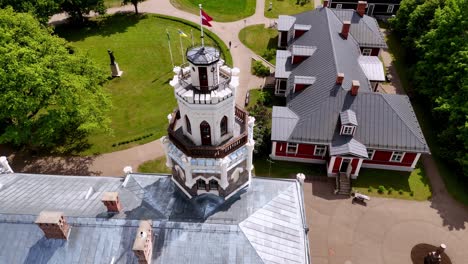 drone establishing above sigulda new castle latvian flag, medieval architecture