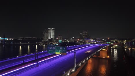 acosta bridge in jacksonville florida at night, with beautiful led or neon lights