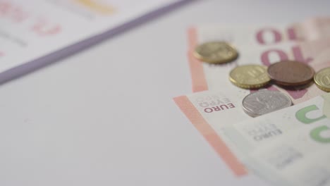 close up of hand counting currency in euros to pay for european energy bill