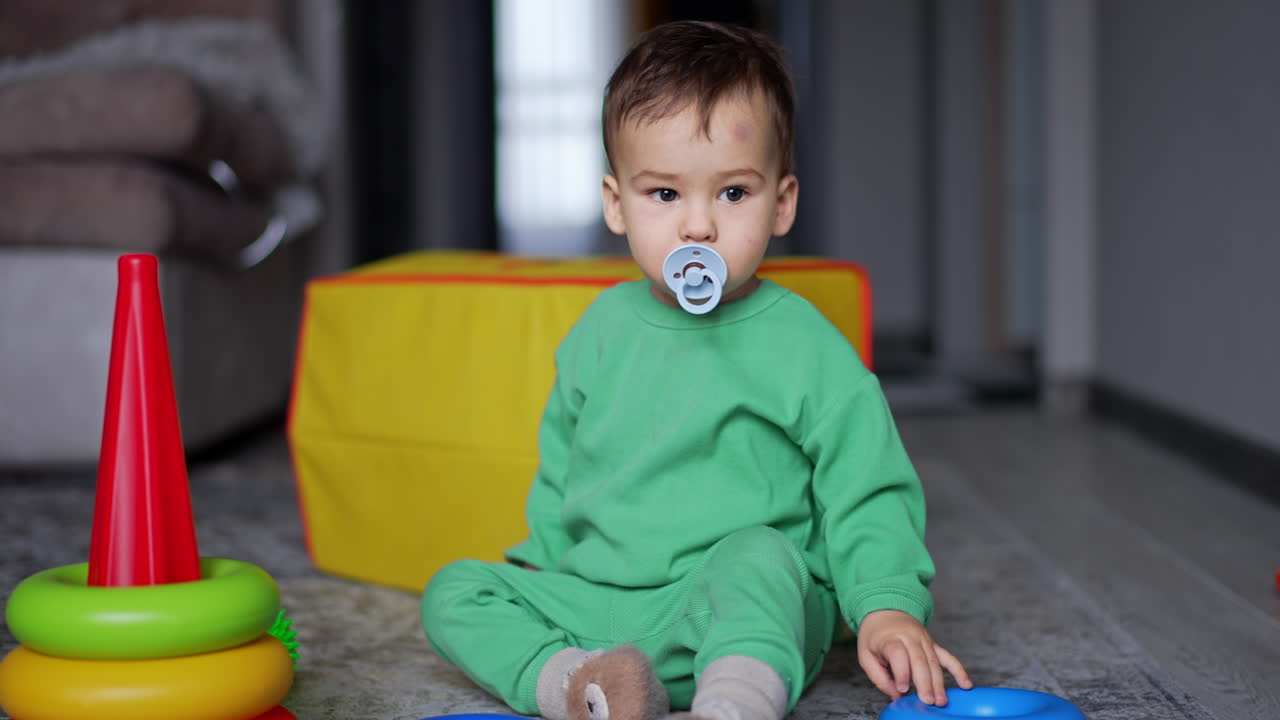 Toddler Playing with Stacking Rings