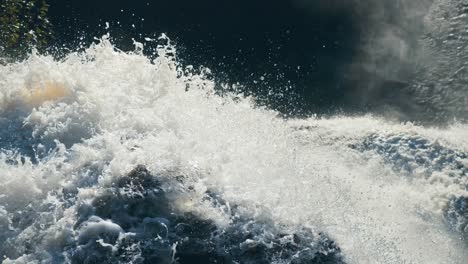 a close-up view of the top of the waterfall