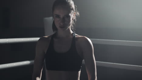 female boxer in training ring