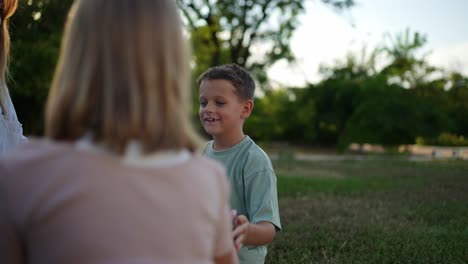 mother and son enjoying a picnic in the park