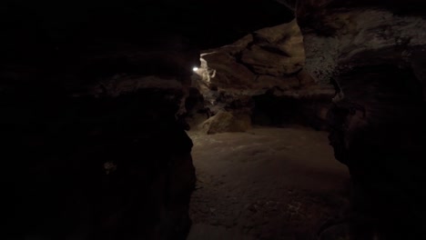 excursion to a dark stone cave in winter a large underground cave excursion to a dark stone cave in winter a large underground cave