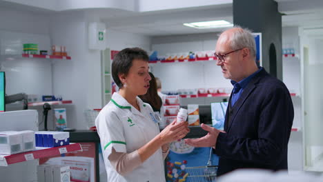 pharmacist offering heart pills