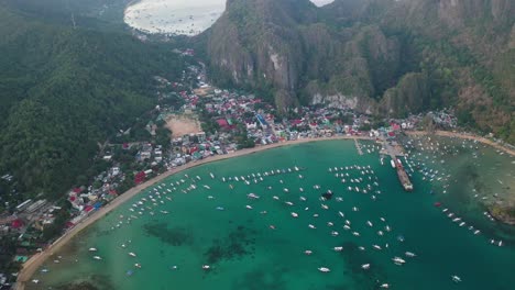 el nido town, palawan island, philippines. drone aerial view of waterfront of famous tourist destination