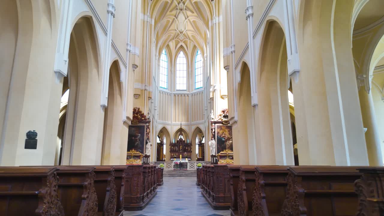 Interior of the Cathedral of Assumption in Kutná Hora, Czech Republic, showcasing Gothic arches