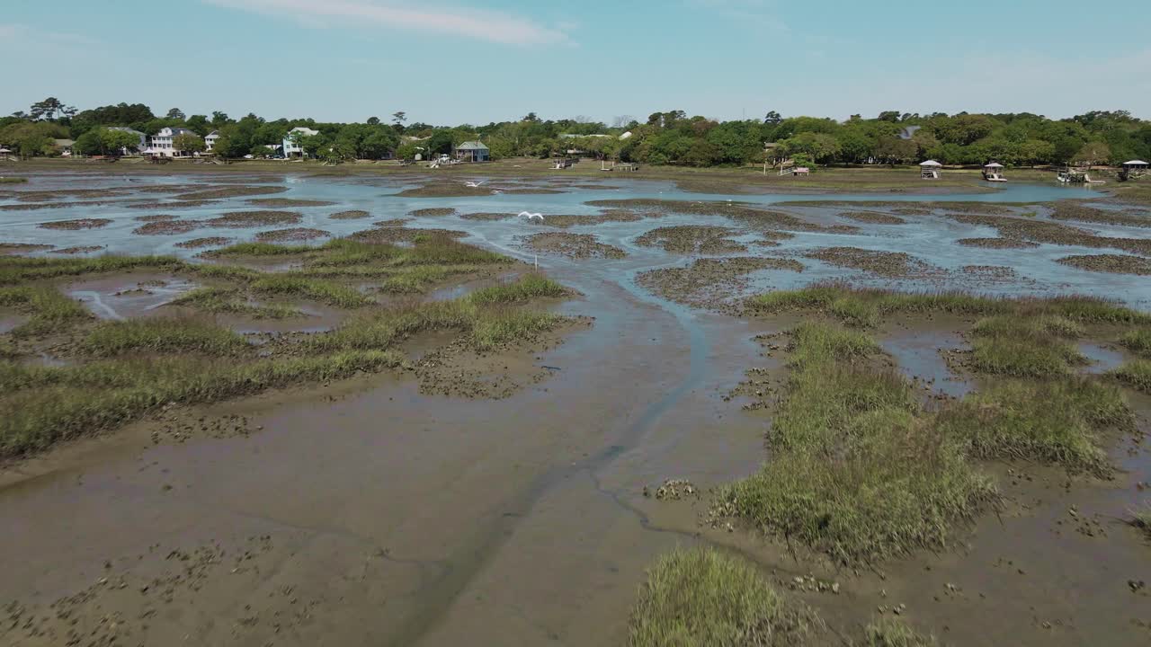 Aerial low attitude shot over flooding fields after horror rainy night
