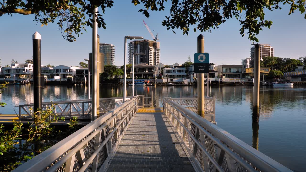 View of a ferry jetty along the Nerang River at the Home of the Arts on the Gold Coast, Australia