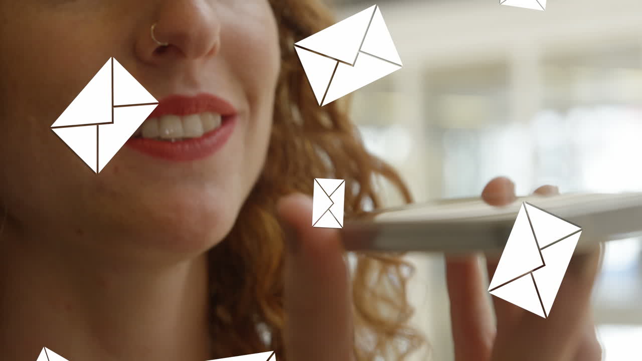 Animation of envelope icons falling over caucasian woman using smartphone