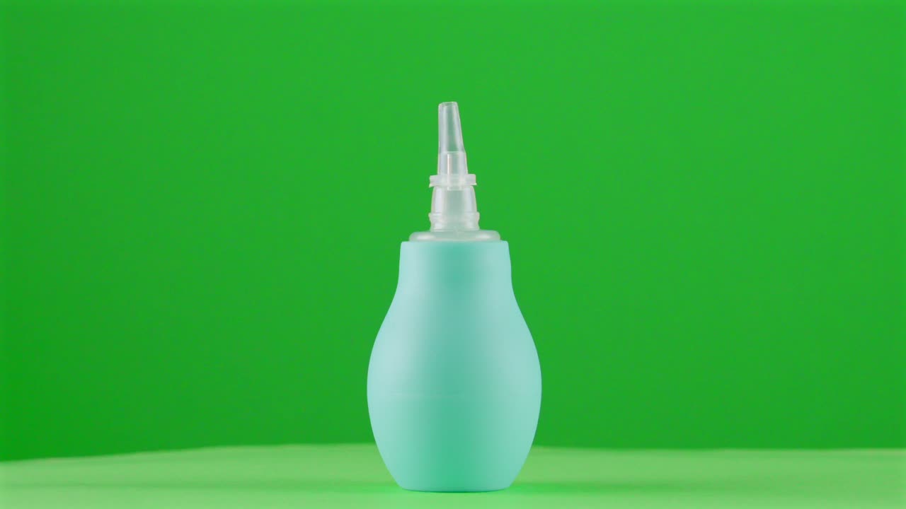 aspirador nasal limpiador de nariz bomba bebé recién nacido niño guardería de salud en un tocadiscos con pantalla verde para la eliminación de fondo 3d