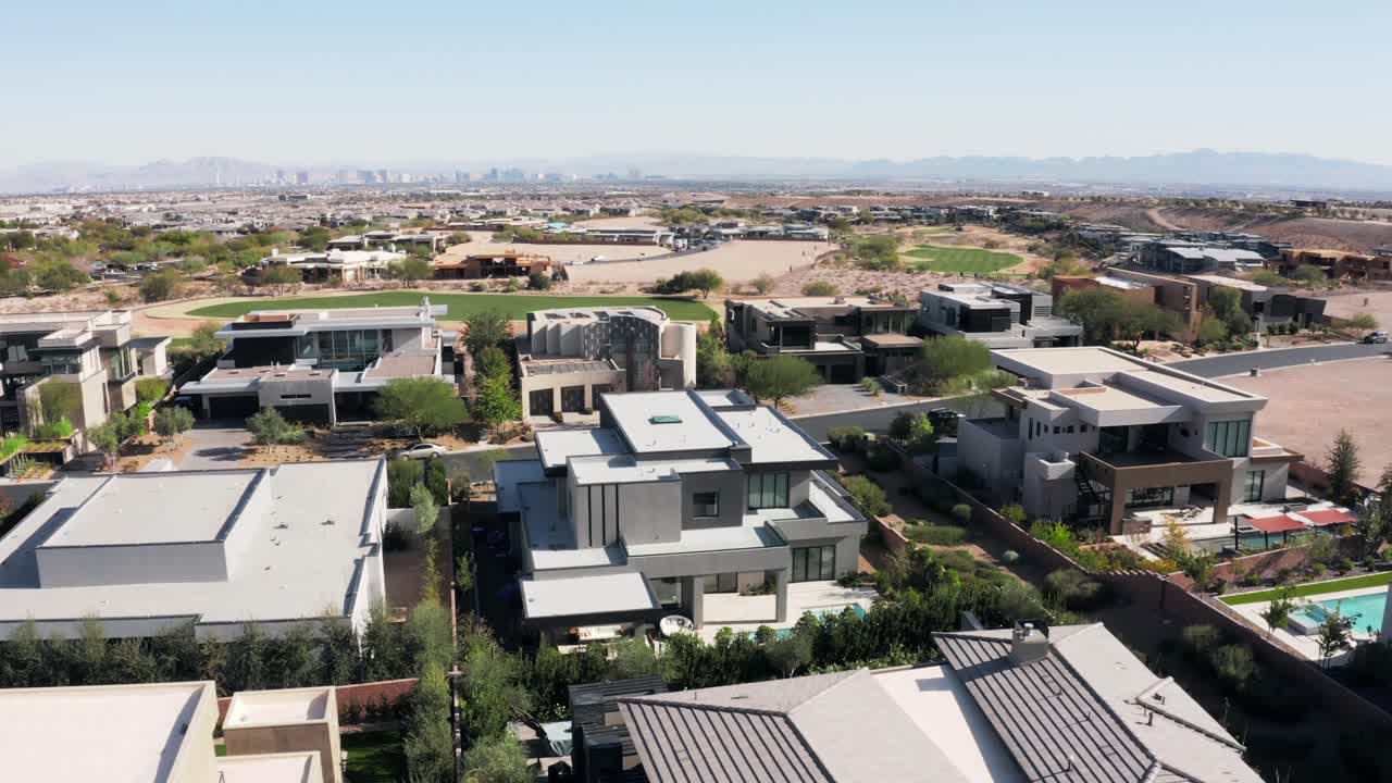 Real estate house community overlooking Las Vegas skyline in distance