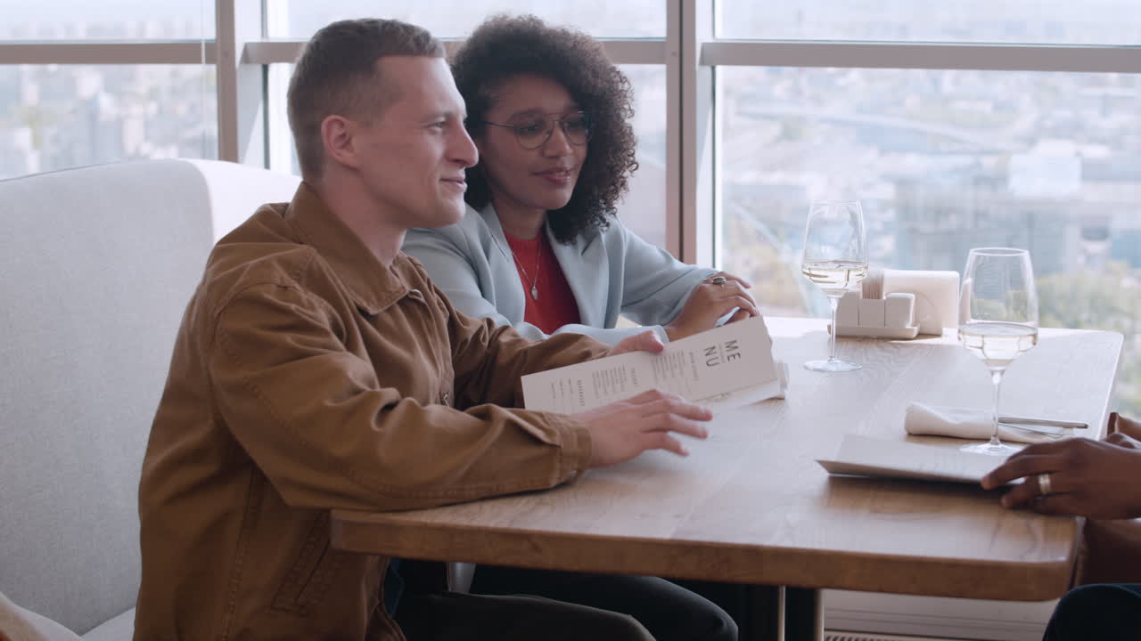 Group of people having a meal in a restaurant