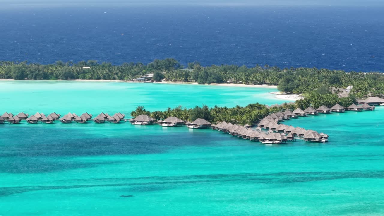 Bora Bora Island, French Polynesia. Drone Shot of Exclusive Luxury Tropical Resort Bungalows and Villas