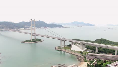 pan right aerial view of hong kong bay and bridges