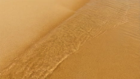sand and water on the beach