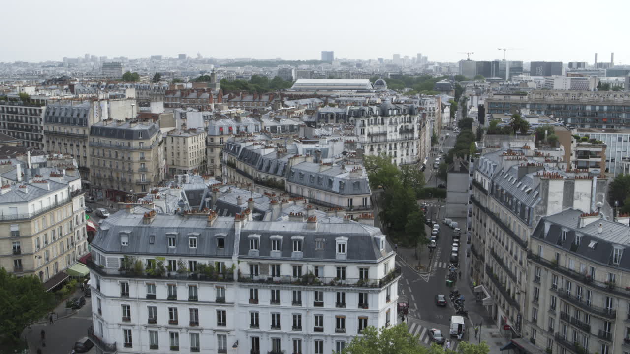 Drone shot going up on a typical Parisian Neighbourhood