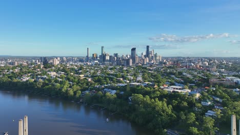 aerial starting with a view of brisbane city to a reveal of the eleanor schonell bridge or better known as the green bridge