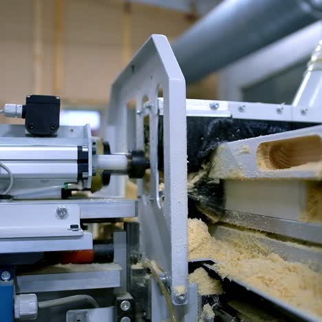 production of doors. making wooden doors on the automated machine tool. modern equipment in workshop for the production of doors. close-up.