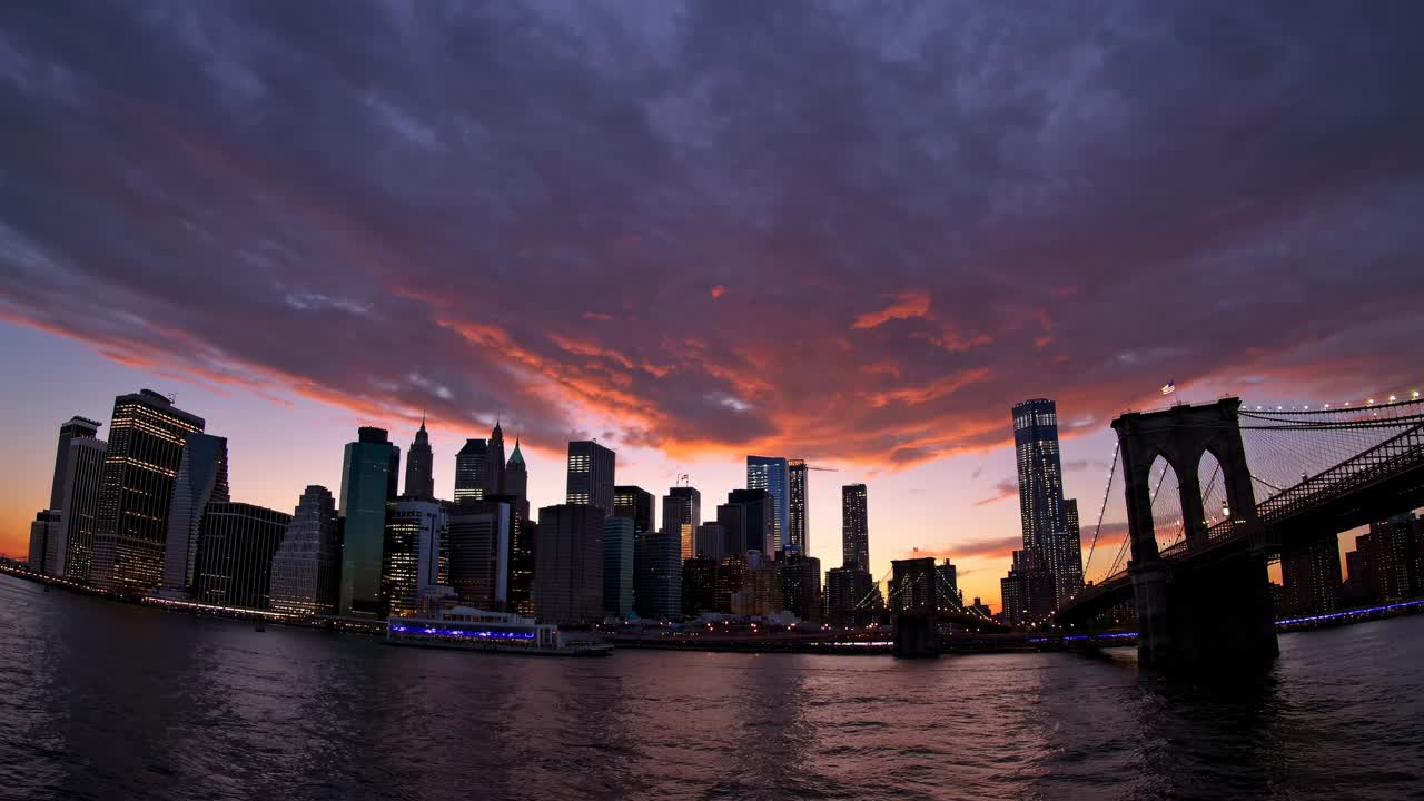 New York City Skyline at Sunset with Brooklyn Bridge
