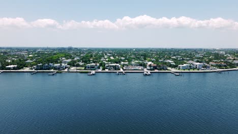 sky high over calm bay and urban edge near south flagler beach, west palm beach