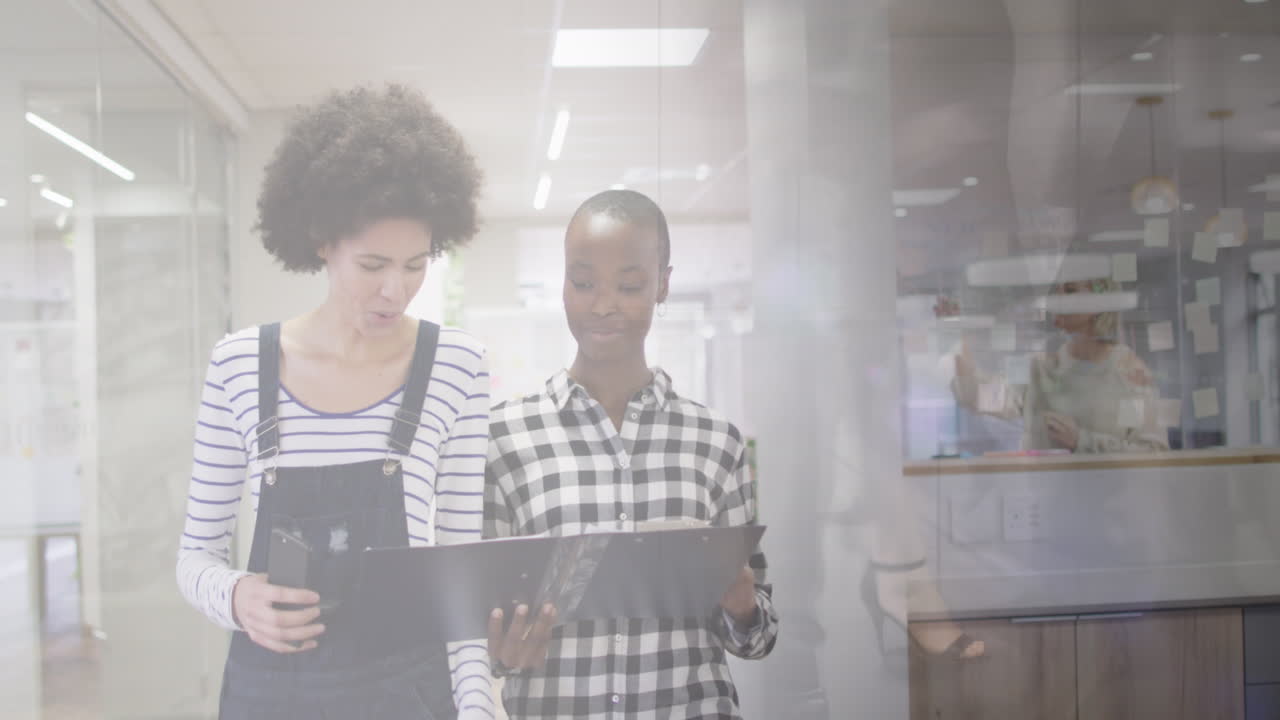 Animation of diverse business people in office over cityscape