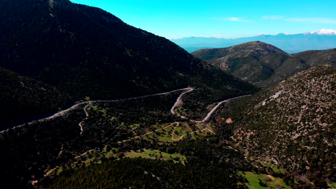Amazing Steep Mountainous Terrain With Lush Vegetation On Bright Blue Sky In Greece - DJI Drone Shot