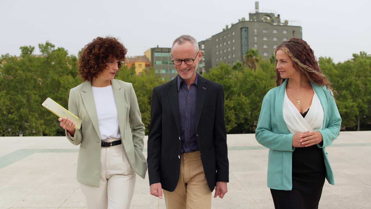 Business professionals walking in an urban setting