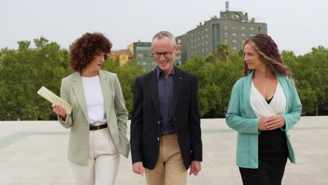 business professionals walking in an urban setting