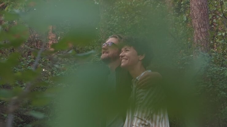 Loving Young Couple On Date In Forest