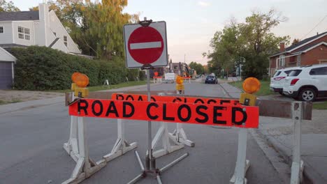 road closed barricade sign in street residential approached